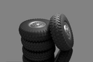 Rubber tires being tested with rubber testing equipment for quality assurance