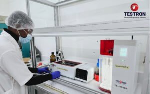 Lab technician checking samples with TT-IVS200 Intrinsic Viscosity Tester at RAGEC Congo