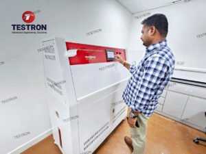 Client operating the Testron UV Weathering Resistance Test Chamber during training session
